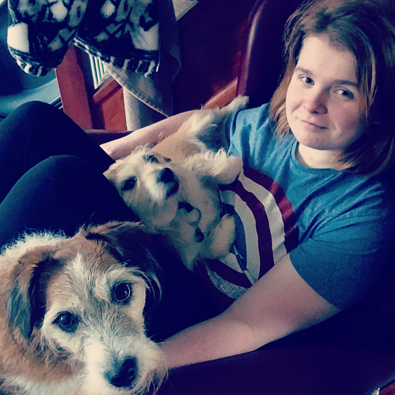 Ami is cuddled up with Max and Molly