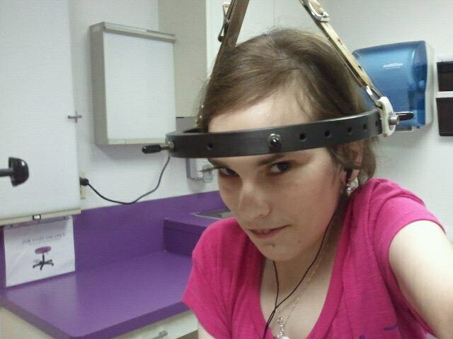 Jamie is wearing a Halo device whilst at Halo Traction, before her surgery.