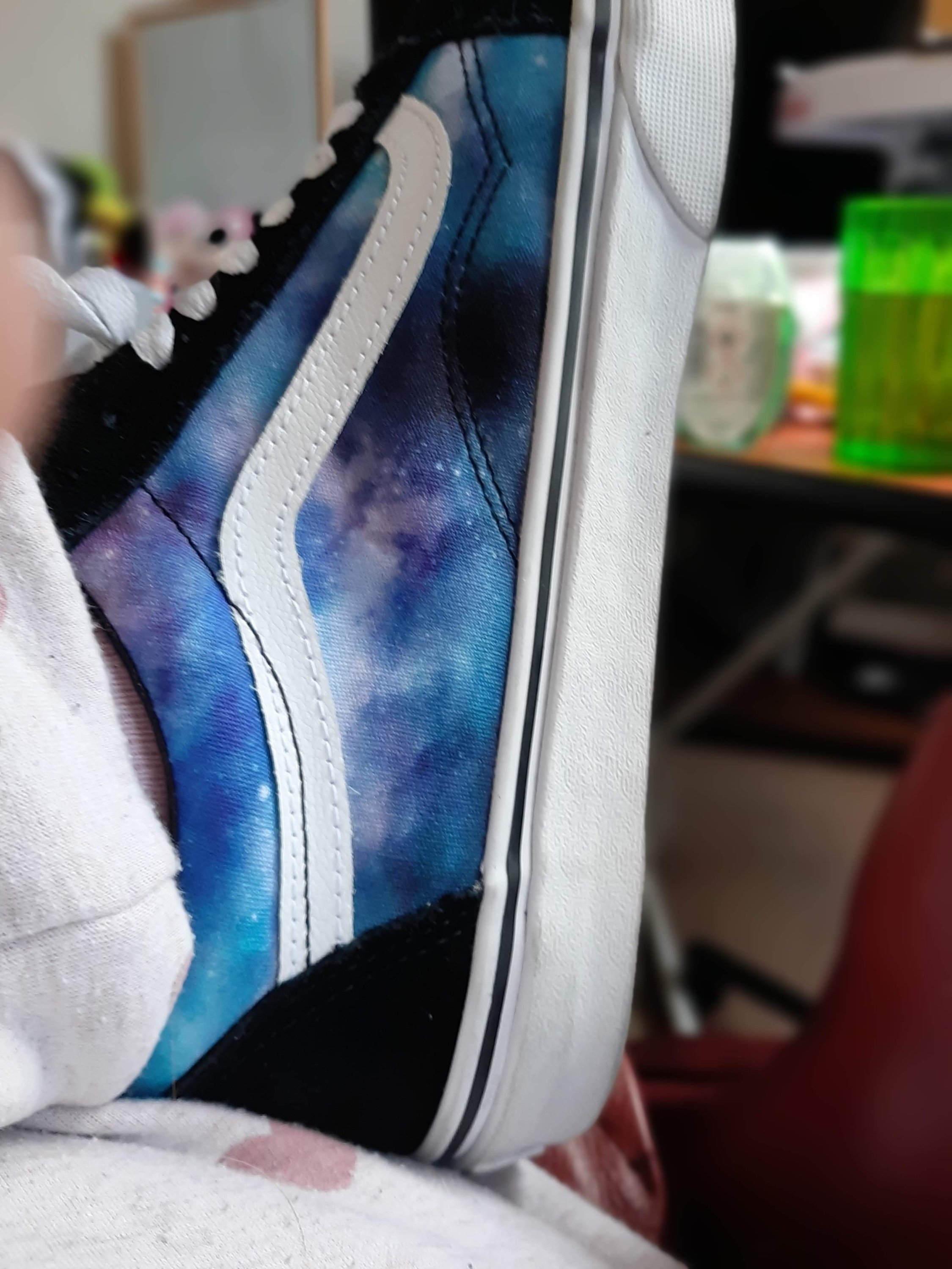 Ami's new Vans, old style type with mainly black and white, with a blue and purple galaxy effect on the sides, with white laces
