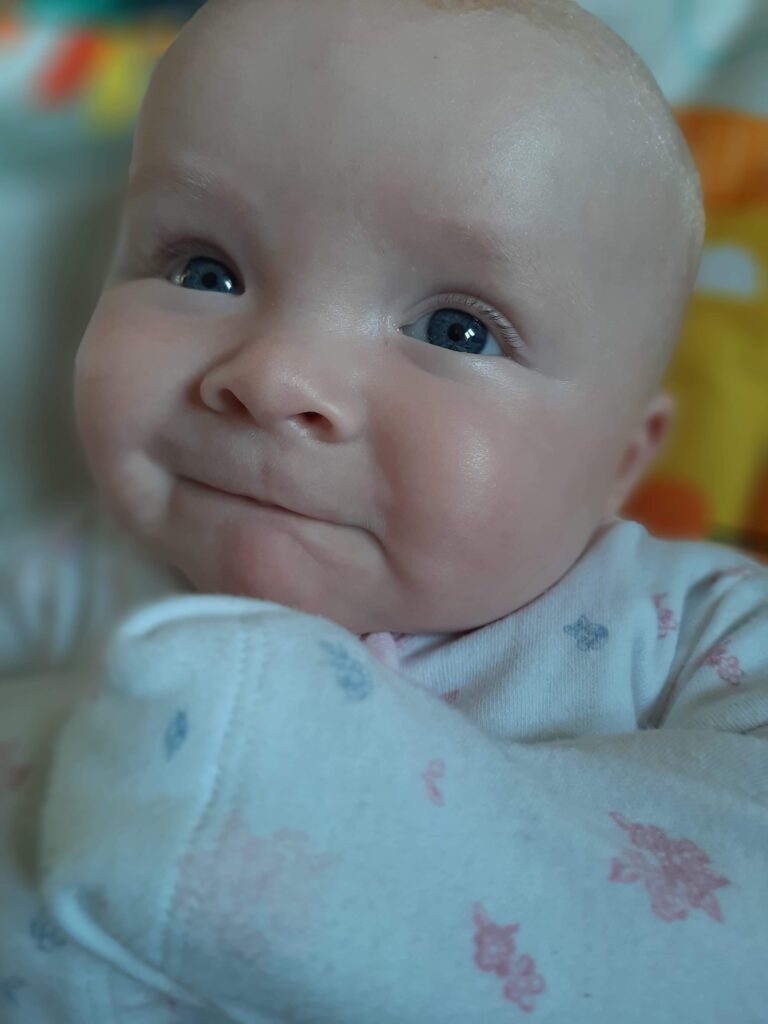Daisy smiling, like butter wouldn't melt
