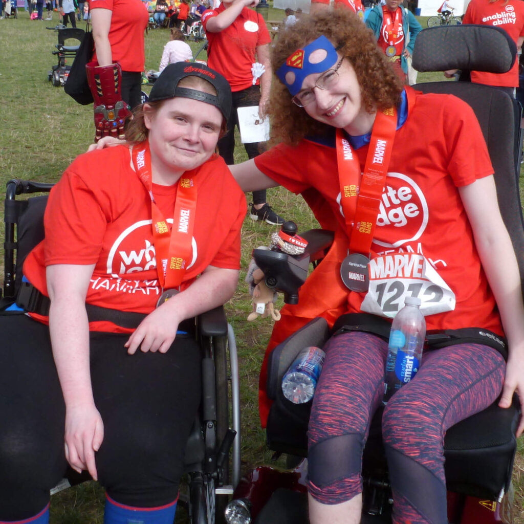 Ami and Hannah smiling, at Superhero Tri 2019
