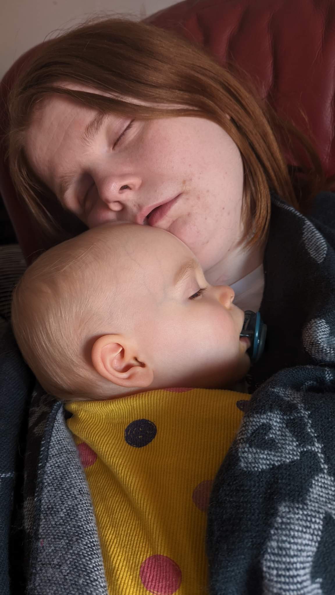 Ami and Daisy are snuggled up together fast asleep.